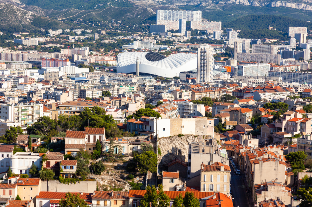 Experience the excitement of the Velodrome Stadium in Marseille, home to Olympique de Marseille and a symbol of passion for football in France. This iconic stadium, with its towering stands and electrifying atmosphere, is a must-visit for sports enthusiasts. Picture yourself cheering alongside thousands of fans as the stadium comes alive with the roar of the crowd. Whether you're attending a thrilling match or taking a guided tour of the facilities, the Velodrome Stadium promises an unforgettable experience. Explore the heart of Marseille's sporting culture and immerse yourself in the excitement of the Velodrome Stadium.